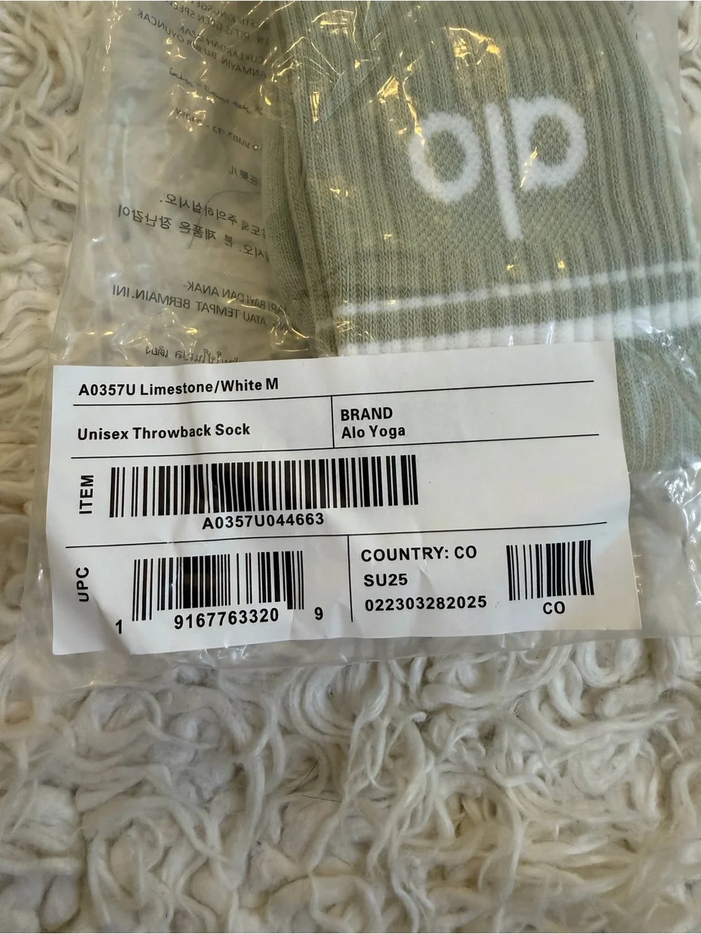 ALO Yoga Crew Socks in Sage Green with White Stripe
